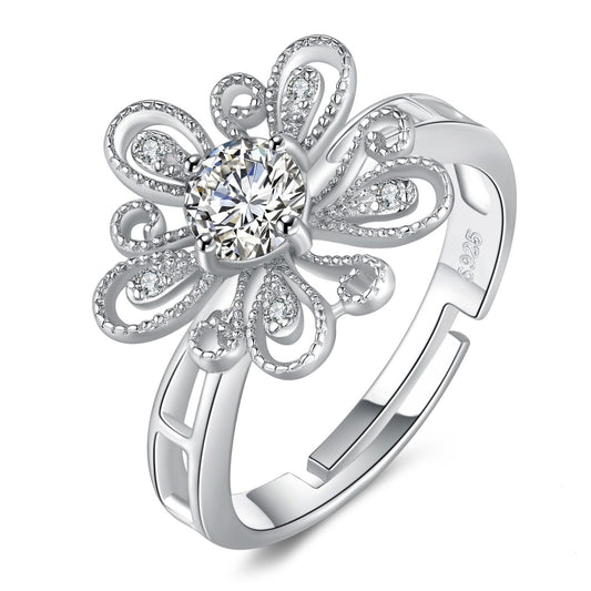 Anillo abierto ajustable con flor de filigrana y circonita cúbica milgrain
