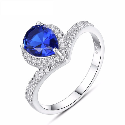 Anillo de lujo con zafiro azul en forma de lágrima