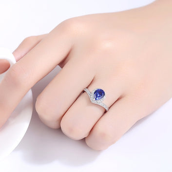 Anillo de lujo con zafiro azul en forma de lágrima