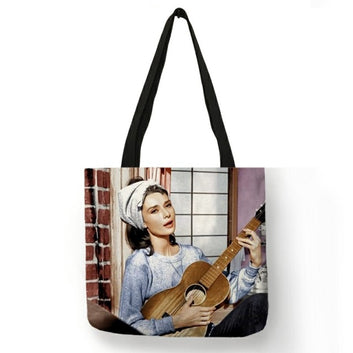 Bolso de mano con estampado de Hepburn y carteles clásicos de celebridades retro